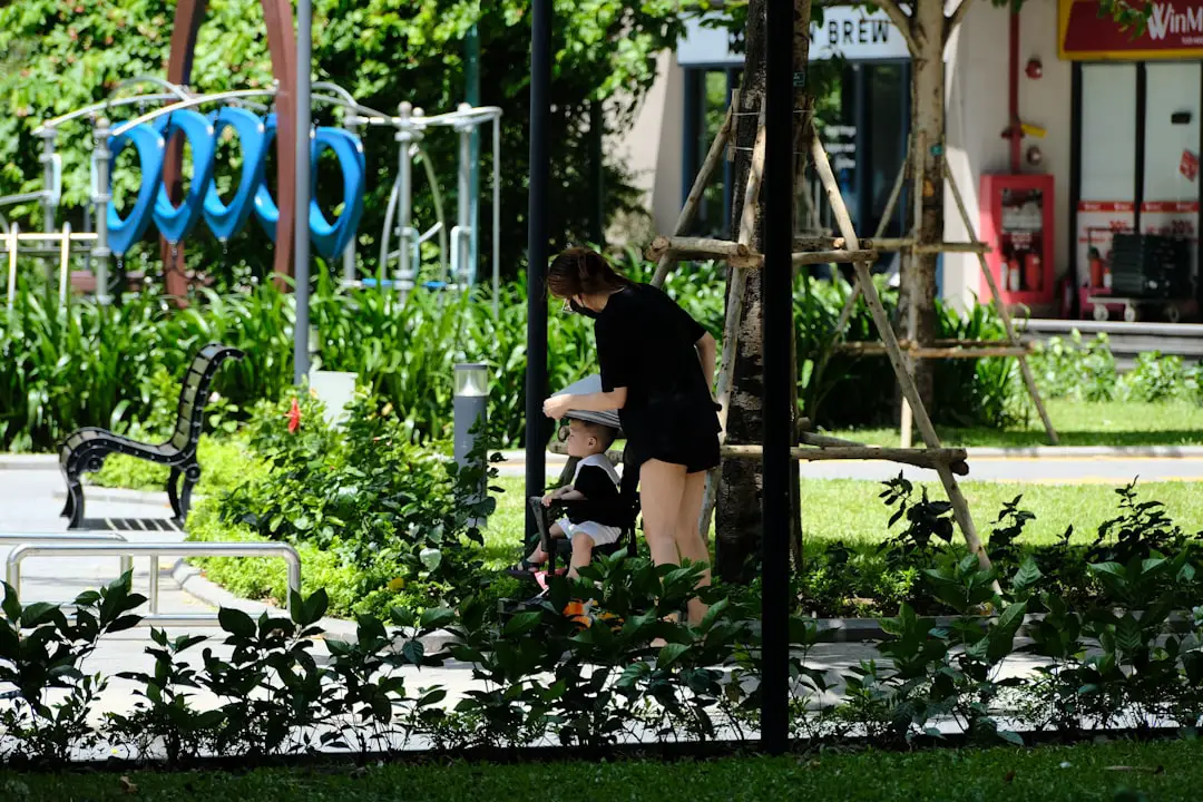 A woman sitting on a bench in a park